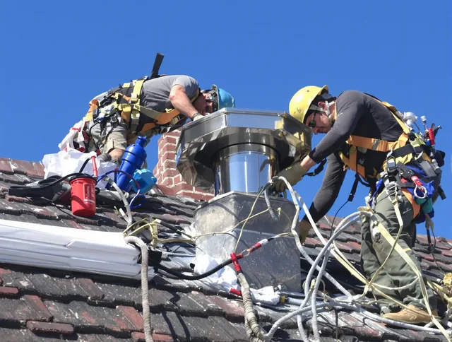 Protective chimney cap installed by Port Orange Chimney Sweep in Port Orange, FL