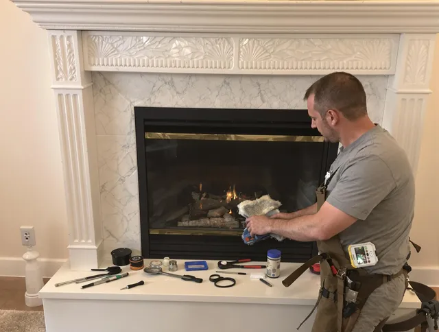Port Orange Chimney Sweep performing fireplace maintenance in Port Orange, FL